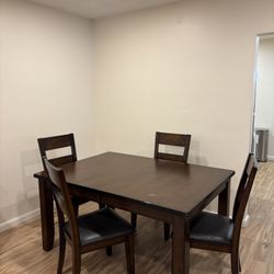Brown Wood Dining Room Table With Chairs