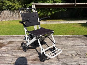 Compact Wheel Chair (never used)