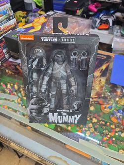 NECA Teenage Mutant Ninja Turtles X MONSTERS Michael Angelo as the Mummy NEW