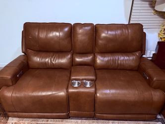 Brown Leather Power Reclining Loveseat with Console | $1223 | OBO