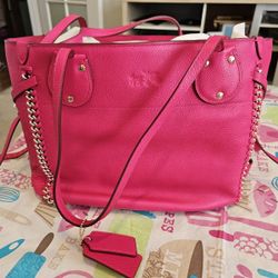 Brand new, never used pink leather Coach Tote.