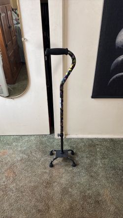 Women’s cane, butterfly design.