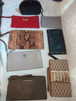 Michael kors and kate spade large leather wristlets