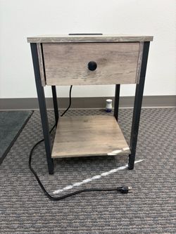 Table with charging outlets