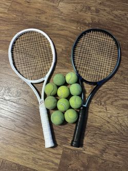Two Tennis Rackets And Balls