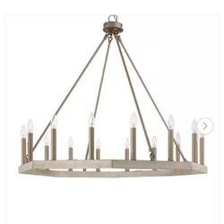 16-Light Farmhouse Vintage Chandelier.  The exclusive white wood and brass dust finish embellish the metalwork, delivering subtle sophistication.  See