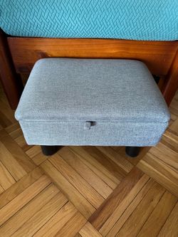 Small footstool with built-in storage