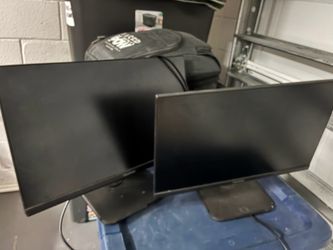 2 black flat screen monitors thin