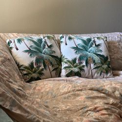Two palm tree coconut themed cushions