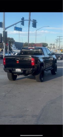 Lifted Black Chevy Colorado Crew Cab Truck
