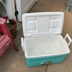 A good, blue cooler, in great condition
