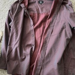 Calvin Klein polo fluorescent fabric. Fits like a medium