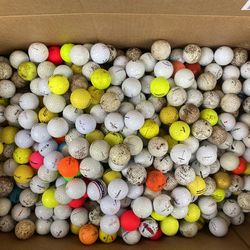 Big Box Almost Full of Brand Named Golf Balls