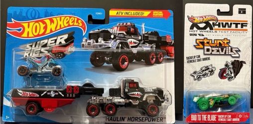 2 New Hotwheels Super Rigs and Stunt Devils