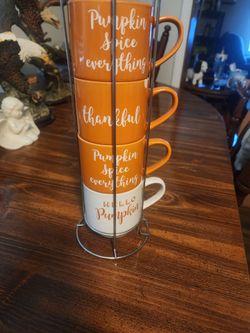 Coffee cups and holder