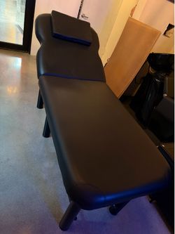 Unused all black leather tattoo massage table/chair