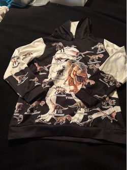 Child’s 100% polyester pull over hoodie dinosaur pattern