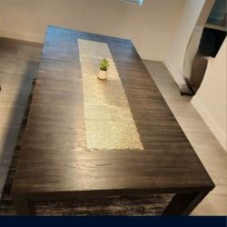 Ashley's Extendable Dining Table Seats Up To 8 People (Possibly 10 Small Chairs)