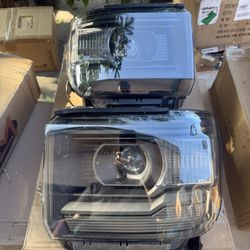 14-15 GMC Sierra 1500/ 15-17 Sierra 2500HD & 3500HD Headlights Black Housing, Clear Corners Luces