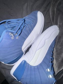 Authentic Air Jordan 12 Retro in the blue/indigo. Size 8