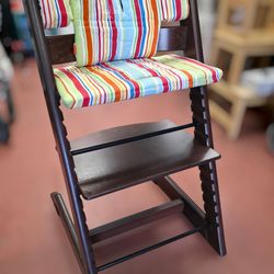 Stokke Tripp Trapp wooden convertible high chair