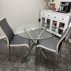 Round Glass Dining Table And Chairs 