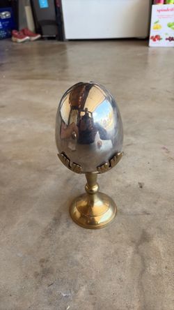 Silver plated egg on stand