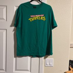 Size Large Teenage Mutant Ninja Turtles T-Shirt.