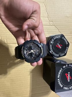 G shock watch black and gold