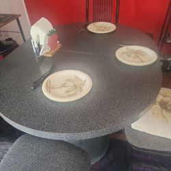 Dining Table And Four Chairs