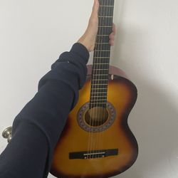 Guitar For Beginners Great Condition And Sounds Good Still!!