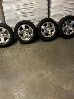 Rims and tires for 2002 Subaru Forester - $180