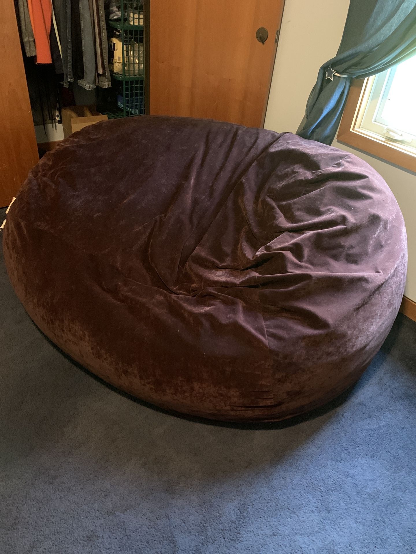Over-sized bean bag with waterproof liner.