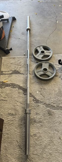 7Ft Olympic Barbell Bar With   Weider Weight Plates 25 Pounds 