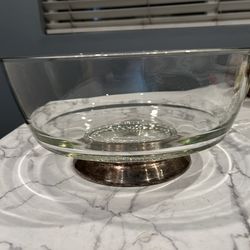 a vintage serving bowl, likely a mid-century piece similar to designs by Dorothy Thorpe, featuring a clear glass body on a silver-plated pedestal base