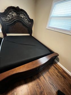 Ornate Wood Bed Frame with Carved Headboard