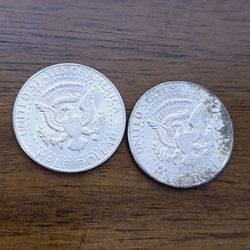 2 silver half dollars