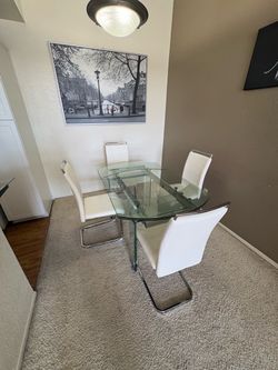 Glass dining table with 4 chairs