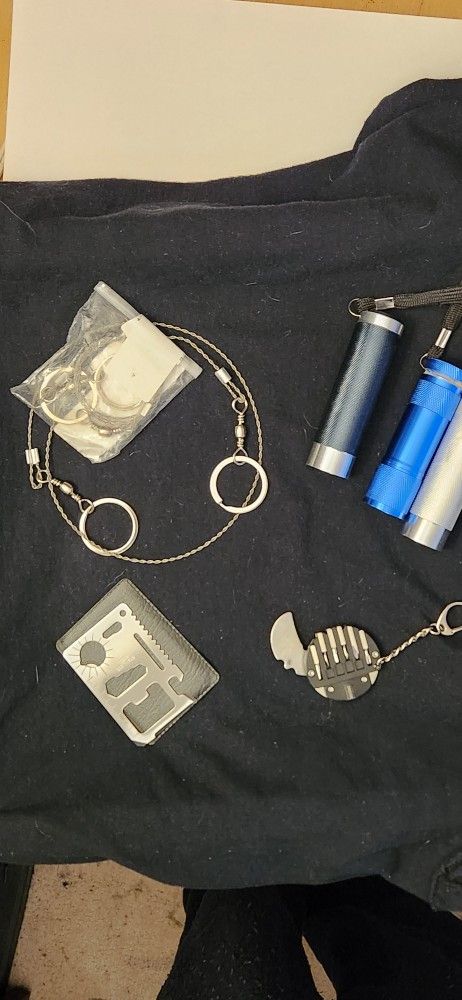 Line Hand Saw, Flashlights And Survival Card And Multi Tool