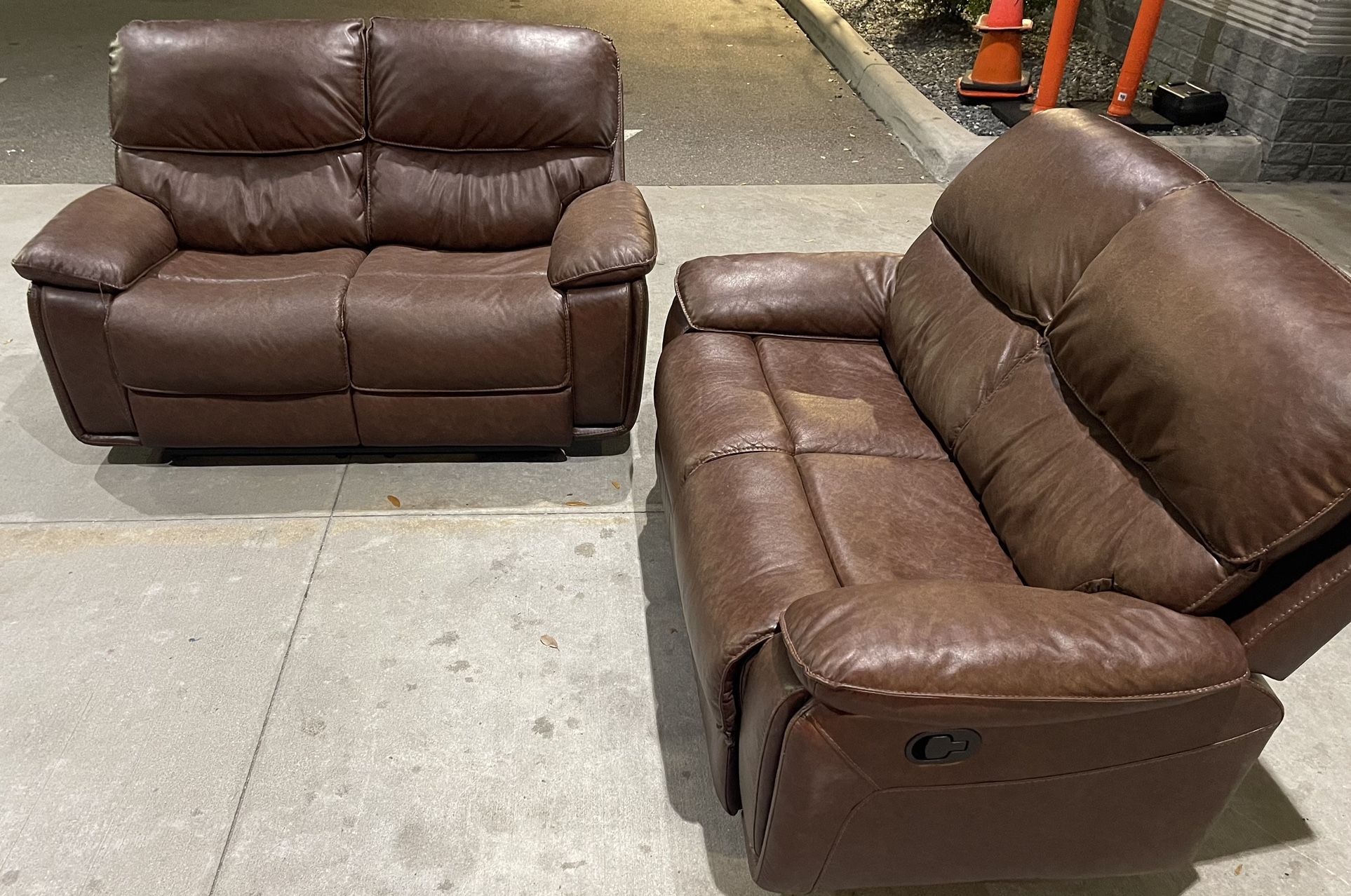 2 Manual Recliners in Brown  like new we deliver