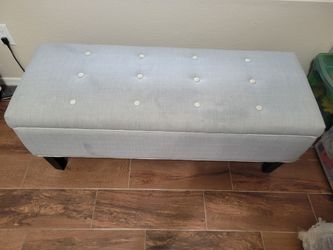 Gray cloth ottoman