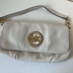 Michael Kors Fulton Chain Link Flap Baguette bag featuring cream