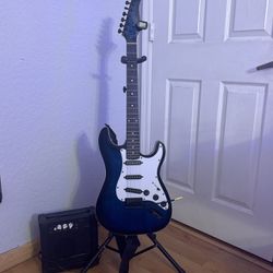 Electric Guitar With Amp And Stand 