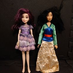 2 Disney Barbie Dolls 