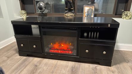 Black used fire place cabinet