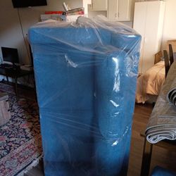 Brand new still in the plastic Blue Loveseat & Blue matching chair