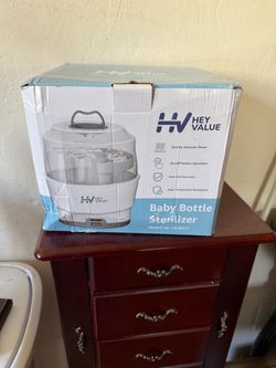 Hey Value Baby Bottle Sterilizer (Model: LS-B317), an electric steam sterilizer designed to clean baby bottles, pacifiers, and pump parts