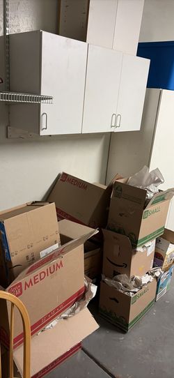 Moving boxes with packing paper