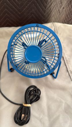 Small blue portable fan