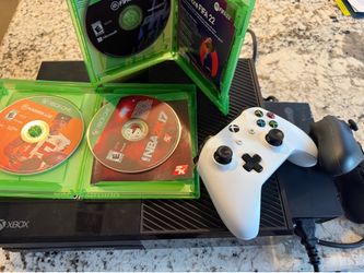 Xbox One w/ two remotes and 3 games
